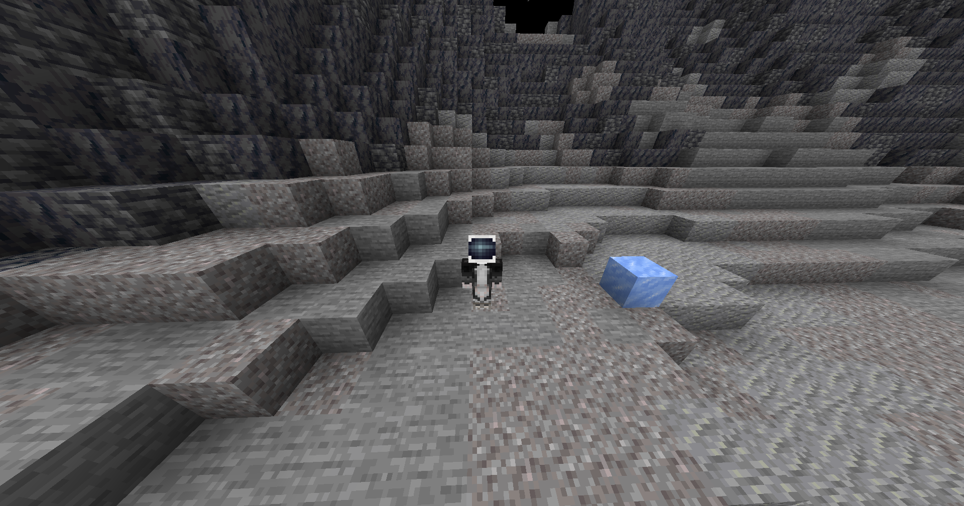 Cocogamingpro standing on the Moon beside a rare blue resource.